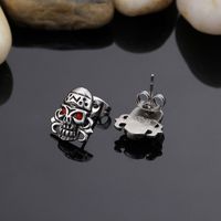 1 Pair Hip-hop Retro Skull Inlay Titanium Steel Rhinestones Ear Studs main image 1