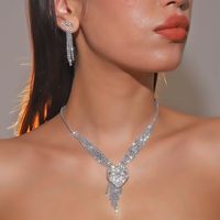 Elegante Estilo Clásico Brillante Geométrico Aleación Embutido Diamantes De Imitación Mujeres Aretes Collar sku image 8