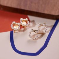1 Pair Sweet Bow Knot Inlay Alloy Artificial Pearls Shell Ear Studs main image 5