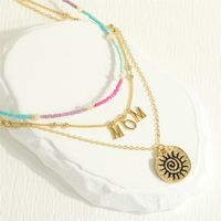 Simple Style Sun Letter Freshwater Pearl Glass Copper Beaded Plating 18k Gold Plated Women's Layered Necklaces main image 9