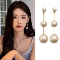 1 Pair Simple Style Solid Color Plating Cotton Pearl Gold Plated Drop Earrings main image 1