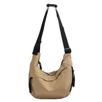 Unisex Canvas Solid Color Basic Dumpling Shape Zipper Shoulder Bag Crossbody Bag sku image 1