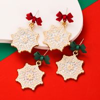 1 Pair Elegant Streetwear Bow Knot Snowflake Enamel Alloy Gold Plated Drop Earrings main image 1