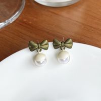1 Pair Elegant Bow Knot Plating Inlay Alloy Artificial Pearls Drop Earrings main image 4