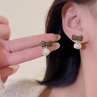 1 Pair Elegant Bow Knot Plating Inlay Alloy Artificial Pearls Drop Earrings main image 3