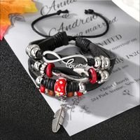 Casual Handmade Feather Pu Leather Alloy Wooden Beads Beaded Knitting Men's Drawstring Bracelets main image 5