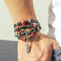 Casual Handmade Feather Pu Leather Alloy Wooden Beads Beaded Knitting Men's Drawstring Bracelets main image 3