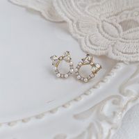 1 Pair Simple Style Bow Knot Plating Inlay Alloy Artificial Rhinestones Artificial Pearls Gold Plated Ear Studs main image 3