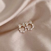 1 Pair Simple Style Bow Knot Plating Inlay Alloy Artificial Rhinestones Artificial Pearls Gold Plated Ear Studs main image 1