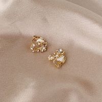 1 Pair Simple Style Bow Knot Plating Inlay Alloy Artificial Rhinestones Artificial Pearls Gold Plated Ear Studs main image 2