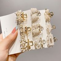 Simple Style Bow Knot Alloy Inlay Pearl Zircon Hair Claws main image 5