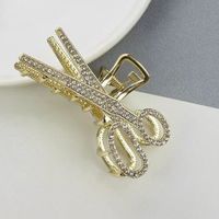 Elegant Star Bow Knot Shell Alloy Plating Hollow Out Inlay Rhinestones Pearl Hair Claws sku image 1