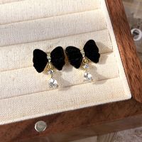 1 Pair Vintage Style Bow Knot Plating Alloy Flocking Gold Plated Drop Earrings main image 9