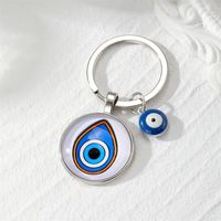 Vintage Style Devil's Eye Palm Alloy Glass Bag Pendant main image 4