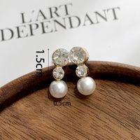 1 Pair Simple Style Korean Style Geometric Plating Inlay Alloy Artificial Rhinestones Artificial Pearls White Gold Plated Gold Plated Ear Studs sku image 1
