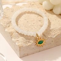 Simple Style Eye Stainless Steel Titanium Steel Plating Inlay Natural Stone White Chalcedony Gold Plated Women's Bracelets main image 6