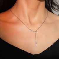 Estilo Simple Estrella Aleación Enchapado Ahuecar Embutido Diamantes De Imitación Mujeres Collar Colgante sku image 1