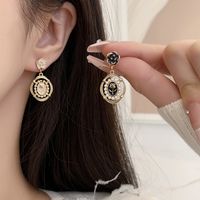 1 Pair Simple Style Classic Style Color Block Plating Inlay Alloy Artificial Pearls Gold Plated Drop Earrings main image 5