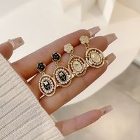 1 Pair Simple Style Classic Style Color Block Plating Inlay Alloy Artificial Pearls Gold Plated Drop Earrings main image 6