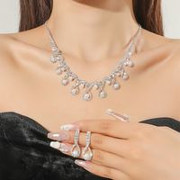 Elegante Estilo Clásico Brillante Geométrico Aleación Embutido Diamantes De Imitación Mujeres Aretes Collar sku image 9
