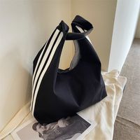 Women's Canvas Solid Color Classic Style Sewing Thread Dumpling Shape Magnetic Buckle Shoulder Bag sku image 1