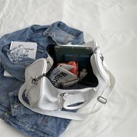 Unisex Pu Leather Solid Color Streetwear Round Zipper Handbag Travel Bag main image 6