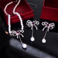 Elegant Bow Knot Imitation Pearl Alloy Inlay Rhinestones Women's Earrings Necklace main image 1