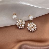 1 Pair Ethnic Style Simple Style Flower Plating Inlay Alloy Pearl Gold Plated Drop Earrings main image 4