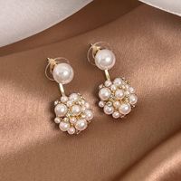 1 Pair Ethnic Style Simple Style Flower Plating Inlay Alloy Pearl Gold Plated Drop Earrings main image 2
