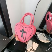 Women's Pu Leather Cross Solid Color Vintage Style Punk Maximalism Sewing Thread Rivet Heart-shaped Zipper Heart-shaped Bag Handbag main image 1