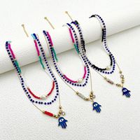 304 Stainless Steel Artificial Crystal Natural Stone Gold Plated Vintage Style Artistic Layered Plating Inlay Palm Crystal Pearl Zircon Three Layer Necklace main image 1