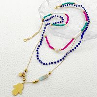 304 Stainless Steel Artificial Crystal Natural Stone Gold Plated Vintage Style Artistic Layered Plating Inlay Palm Crystal Pearl Zircon Three Layer Necklace main image 2