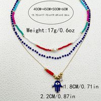 304 Stainless Steel Artificial Crystal Natural Stone Gold Plated Vintage Style Artistic Layered Plating Inlay Palm Crystal Pearl Zircon Three Layer Necklace main image 4