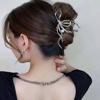 Elegant Lady Simple Style Bow Knot Imitation Pearl Alloy Plastic Three-dimensional Hair Claws main image 1