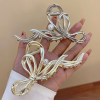 Elegant Lady Simple Style Bow Knot Imitation Pearl Alloy Plastic Three-dimensional Hair Claws main image 2