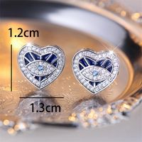 1 Pair Simple Style Devil's Eye Heart Shape Enamel Inlay Copper Zircon Ear Studs main image 3