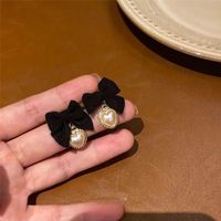 Großhandel Schmuck Elegant Herzform Bogenknoten Legierung Künstliche Perlen Zirkon Überzug Inlay Ohrringe sku image 24