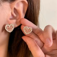 Großhandel Schmuck Elegant Herzform Bogenknoten Legierung Künstliche Perlen Zirkon Überzug Inlay Ohrringe sku image 6