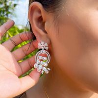 1 Pair Elegant Princess Irregular Leaves Snowflake Plating Hollow Out Inlay Copper Artificial Pearls Zircon Rhodium Plated Silver Plated Drop Earrings main image 1