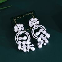 1 Pair Elegant Princess Irregular Leaves Snowflake Plating Hollow Out Inlay Copper Artificial Pearls Zircon Rhodium Plated Silver Plated Drop Earrings main image 3