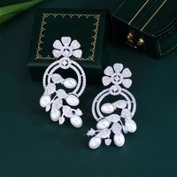 1 Pair Elegant Princess Irregular Leaves Snowflake Plating Hollow Out Inlay Copper Artificial Pearls Zircon Rhodium Plated Silver Plated Drop Earrings main image 4