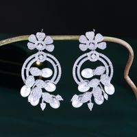 1 Pair Elegant Princess Irregular Leaves Snowflake Plating Hollow Out Inlay Copper Artificial Pearls Zircon Rhodium Plated Silver Plated Drop Earrings main image 6