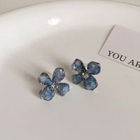 1 Pair Simple Style Flower Inlay Copper Zircon Ear Studs main image 1