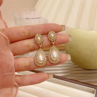 1 Pair Ig Style Simple Style Water Droplets Plating Inlay Alloy Acrylic Rhinestones Pearl Gold Plated Drop Earrings Ear Cuffs main image 5