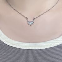 Simple Style Bow Knot Snowflake Stainless Steel Copper Plating Inlay Rhinestones White Gold Plated Pendant Necklace main image 3