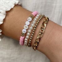Casual Vacation Letter Artificial Pearl Alloy Soft Clay Beaded Gold Plated Women's Bracelets main image 3