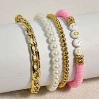 Casual Vacation Letter Artificial Pearl Alloy Soft Clay Beaded Gold Plated Women's Bracelets main image 4