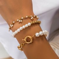 Style Vintage Géométrique Couleur Unie Perle D'imitation Alliage Placage Incruster Strass Femmes Bracelets main image 1