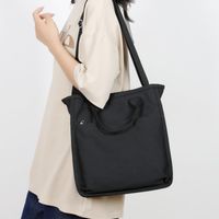Women's Canvas Solid Color Streetwear Square Zipper Handbag main image video