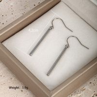 1 Pair XUPING Simple Style Classic Style Solid Color 304 Stainless Steel 18K Gold Plated Raw Steel Black Gun Drop Earrings main image 7